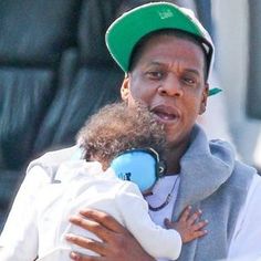 Jay-Z's doughter wearing Baby Banz ear muffs
